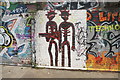 View of skeleton street art on a wall on Stour Road