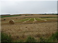 Stubble field with bales west of the A952