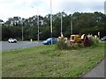 TQ0781 : Tractor on Stilwell Roundabout on the A408 by Rod Allday