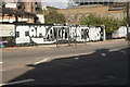 View of "I Am Thankful for our NHS" street art on Commercial Road