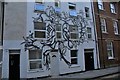 View of street art on the front of an apartment block on Turville Street