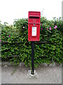 NK0563 : Elizabethan postbox on High Street, St Combs by JThomas