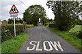 Sign for school and slow marking along Clogherny Road