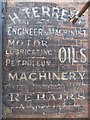 ST6899 : An old painted advertisement for oils by Neil Owen
