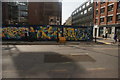 TQ3182 : View of a mural on a construction hoarding on Goswell Road by Robert Lamb