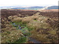 NS6510 : Boggy moorland on Hare Hill by Chris Wimbush