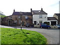 Old sign and cottages, Naegill End, Grewelthorpe