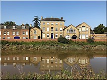 TF4509 : Wisbech Grammar School and its reflection in the River Nene by Richard Humphrey
