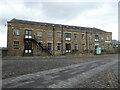 SE1416 : The older of two railway warehouses in Huddersfield by Chris Allen