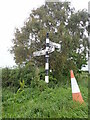 NY3254 : Signpost, Great Orton by Eirian Evans
