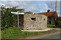 Wartime pillbox on junction near Summer Green Farm