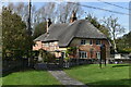 Thatched house overlooking the churchyard at Bishops Cannings