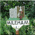 TF9119 : Mileham village sign (detail) by Adrian S Pye
