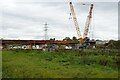 SO8551 : Crane constructing bridge over the Severn by Philip Halling