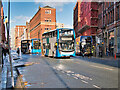 SJ8498 : Buses on Newton Street by David Dixon