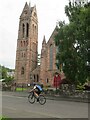 Cyclist passes Crieff Parish Church