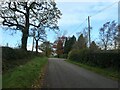 Road passing Heath Holding Farm