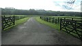 Fenced driveway to Burns Farm