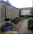 Picnic tables in Crickhowell Library Community Garden