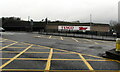 Tesco name sign in Bridgend town centre