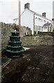 Tiered flower tubs alongside Main Road, Coychurch