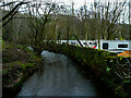 The River Holme passing Holme Valley Camping and Caravan Park