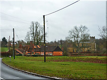 TL9847 : The Grange and church, Chelsworth by Robin Webster