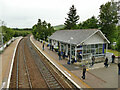 Waiting passengers at Huntly station