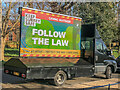TQ2550 : COVID-19 advertising van, Priory Park - 1 by Ian Capper