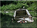 Unmaintained canal maintenance boat