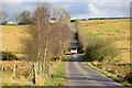 A car heads up Moylagh Road