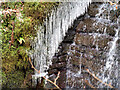 SD7815 : Icicles on the Weir by David Dixon
