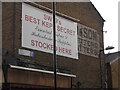 Ghost sign on Hamilton Road, Merton