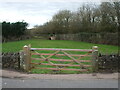 Stone posts and a wooden gate on Abbots Road