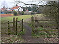 TG3227 : Gate at Entrance to Path to Dilham Road by David Pashley