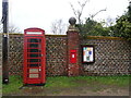 Disused phone box, post box and notice board