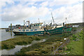 Craft moored beside Potton Creek