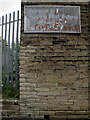 Sign on the derelict Wapping First School, Prospect Road, Bradford