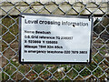 Bridleway 1550 - information plate at level crossing