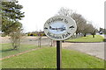 TF8432 : Blenheim Park village sign by Adrian S Pye