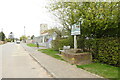 TF7602 : Gooderstone village sign by Adrian S Pye