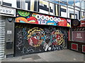 View of shutter art on Bounce sports bar on Old Street