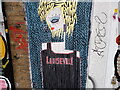 View of "Louiseville" street art on Redchurch Street