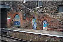 TQ3092 : Palmers Green Station : mosaics by Jim Osley