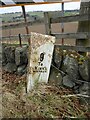 Old milepost by the A93