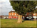 Row of shops facing onto a green on Everdon Road, Coventry