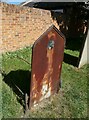 Unusual metal grave marker in Old Woking Churchyard