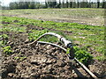 ST9577 : Water pipe in a cleared field by Neil Owen