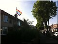 NHS rainbow flag flying from house on Barker