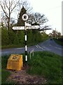 Signpost at junction of Oak Lane, Bridle Brook Lane and Washbrook Lane, Hawkes End